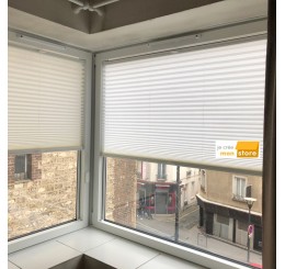 Store plissé entre parcloses